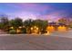 Beautifully landscaped home exterior showcasing well-maintained grounds and curb appeal at 5680 N Fort Apache Rd, Las Vegas, NV 89149