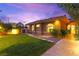 Beautiful single-story home with a well-maintained lawn, tile roof and an intimate courtyard at 5680 N Fort Apache Rd, Las Vegas, NV 89149
