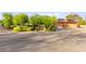 Beautiful single story home with tile roof, mature landscaping, and gated front entry at 5680 N Fort Apache Rd, Las Vegas, NV 89149