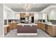 Modern kitchen featuring an island, stainless steel appliances, and stylish cabinetry at 5680 N Fort Apache Rd, Las Vegas, NV 89149