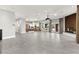 Bright and airy living area featuring a fireplace and open kitchen at 5680 N Fort Apache Rd, Las Vegas, NV 89149