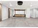 Living room features a large projection screen, modern furnishings, and a neutral color palette at 5680 N Fort Apache Rd, Las Vegas, NV 89149