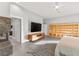 Comfortable main bedroom with fireplace, TV and a cozy sitting area at 5680 N Fort Apache Rd, Las Vegas, NV 89149