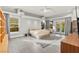 Spacious main bedroom with a fireplace, backyard access, and neutral tones at 5680 N Fort Apache Rd, Las Vegas, NV 89149