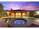 Stunning backyard features a sparkling pool and spa, perfect for outdoor relaxation and entertaining at 5680 N Fort Apache Rd, Las Vegas, NV 89149