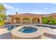 Inviting pool and spa with covered patio, perfect for outdoor relaxation and entertaining at 5680 N Fort Apache Rd, Las Vegas, NV 89149