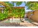 Inviting outdoor water feature boasts stone accents and lush greenery, perfect for relaxation at 5680 N Fort Apache Rd, Las Vegas, NV 89149