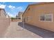 Desert backyard with a gravel landscape, fully fenced for privacy, offering a low-maintenance outdoor space at 6041 Rosanna St, Las Vegas, NV 89113