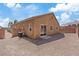 Low maintenance backyard with block wall fence and a slider entry to the home at 6041 Rosanna St, Las Vegas, NV 89113