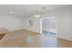 Bright dining space with tile floors, adjacent to the kitchen, offering ample natural light at 6041 Rosanna St, Las Vegas, NV 89113