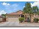 Charming single-story home with desert landscaping and a two-car garage at 6041 Rosanna St, Las Vegas, NV 89113