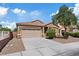 Charming single-story home with desert landscaping and a two-car garage at 6041 Rosanna St, Las Vegas, NV 89113