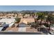 Aerial view of a charming single-story home in a tranquil neighborhood, highlighting its curb appeal at 6209 Lenaking Ave, Las Vegas, NV 89122