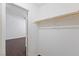 Empty walk-in closet with rod for hanging clothes, and hardwood floors at 6209 Lenaking Ave, Las Vegas, NV 89122