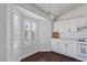 Bright kitchen with white cabinets, stainless steel appliances and natural light at 6209 Lenaking Ave, Las Vegas, NV 89122