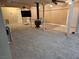Comfortable living room featuring a fireplace, ceiling fans, and neutral carpeting at 66 Lailani St, Las Vegas, NV 89110
