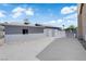 View of the exterior of the home with a large patio at 6741 Bonillo Dr, Las Vegas, NV 89103