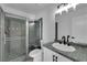 Bathroom featuring a tiled shower and modern fixtures at 6741 Bonillo Dr, Las Vegas, NV 89103