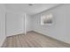 Bedroom with a window and double-door closet at 6741 Bonillo Dr, Las Vegas, NV 89103