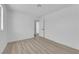 Bedroom featuring light wood-look floors and white walls at 6741 Bonillo Dr, Las Vegas, NV 89103