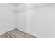 Walk-in closet with white walls and floors at 6741 Bonillo Dr, Las Vegas, NV 89103