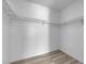 Walk-in closet with rod and shelf providing storage space at 6741 Bonillo Dr, Las Vegas, NV 89103