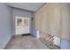 Covered front entry with double doors, offering privacy and protection from the elements at 6741 Bonillo Dr, Las Vegas, NV 89103