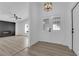 Welcoming entryway featuring double doors with decorative glass and stylish light fixture at 6741 Bonillo Dr, Las Vegas, NV 89103