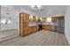 Bright, renovated kitchen with modern appliances, wooden cabinets, and an open floor plan at 6741 Bonillo Dr, Las Vegas, NV 89103