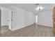 Bright living room with modern flooring and neutral walls, creating a spacious feel at 6741 Bonillo Dr, Las Vegas, NV 89103