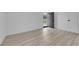 Room with light wood-look floors and a door to outside at 6741 Bonillo Dr, Las Vegas, NV 89103