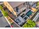 Aerial view of a backyard featuring a pool, spa, patio, outdoor seating, landscaping, and privacy walls at 7311 Spring Flower Ave, Las Vegas, NV 89117