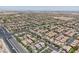Extensive aerial view showcasing the neighborhood layout and homes in a well-planned community at 7775 Santos Bay Ct, Las Vegas, NV 89179