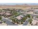 A neighborhood with varied architecture and landscaping offers a diverse and visually appealing environment at 7775 Santos Bay Ct, Las Vegas, NV 89179