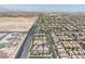 Wide aerial view of the community showing the neighborhood layout and surrounding desert landscape at 7775 Santos Bay Ct, Las Vegas, NV 89179