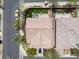 An overhead view highlights a private backyard with artificial turf, patio space, perfect for relaxing outdoors at 7775 Santos Bay Ct, Las Vegas, NV 89179