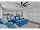 Spacious open-concept living room with stairs to the second floor, featuring modern decor at 7775 Santos Bay Ct, Las Vegas, NV 89179