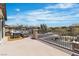 Outdoor patio with patio furniture and views of a neighborhood under a blue sky at 7775 Santos Bay Ct, Las Vegas, NV 89179
