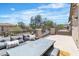 Cozy outdoor patio area with comfortable seating and a stylish table, great for outdoor enjoyment at 7775 Santos Bay Ct, Las Vegas, NV 89179