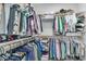 Well-organized walk-in closet with ample hanging space and shelving for clothes and accessories at 7775 Santos Bay Ct, Las Vegas, NV 89179