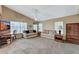 This is an office in a bedroom with neutral colors, ceiling fan, and ample natural light at 8229 Sedona Sunrise Dr, Las Vegas, NV 89128