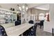 Formal dining room with elegant chandelier and display cabinet at 8229 Sedona Sunrise Dr, Las Vegas, NV 89128