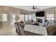Bright living room features an entertainment center, cozy seating and fireplace at 8229 Sedona Sunrise Dr, Las Vegas, NV 89128