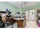 Functional home office with classic wooden desk, shelves, and ample storage at 8229 Sedona Sunrise Dr, Las Vegas, NV 89128