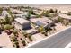 Expansive single-story home featuring a detached garage and solar panels in a well-landscaped, gated community at 8713 Long Winter Ct, Las Vegas, NV 89131
