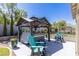 Outdoor oasis featuring a hot tub and pergola at 8713 Long Winter Ct, Las Vegas, NV 89131
