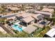 Aerial shot showcasing a spacious backyard with a pool, patio, spa, and meticulous landscaping at 8713 Long Winter Ct, Las Vegas, NV 89131
