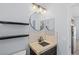Powder room featuring stylish fixtures and neutral tones at 8713 Long Winter Ct, Las Vegas, NV 89131