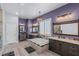 A luxurious bathroom featuring a soaking tub, dual vanities, and a separate glass shower at 8713 Long Winter Ct, Las Vegas, NV 89131
