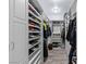 Spacious walk-in closet with custom shelving and ample storage for clothes and shoes at 8713 Long Winter Ct, Las Vegas, NV 89131